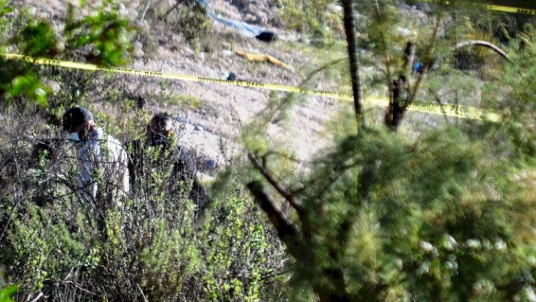 Encuentran cuerpo envuelto en una lona