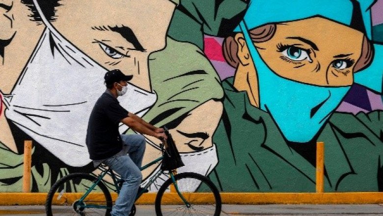 México rebasa 220 mil casos de COVID-19 con medio país en semáforo naranja